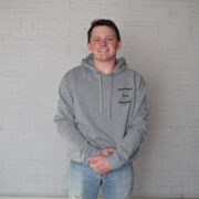 Gray hoodie with black Self Love Beauty logo