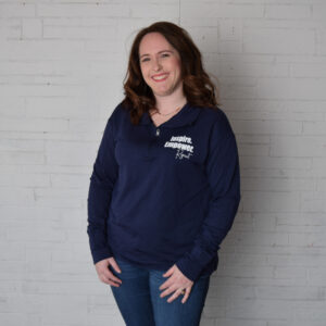 "Empower. Inspire. Repeat" long sleeve zip up in dark blue